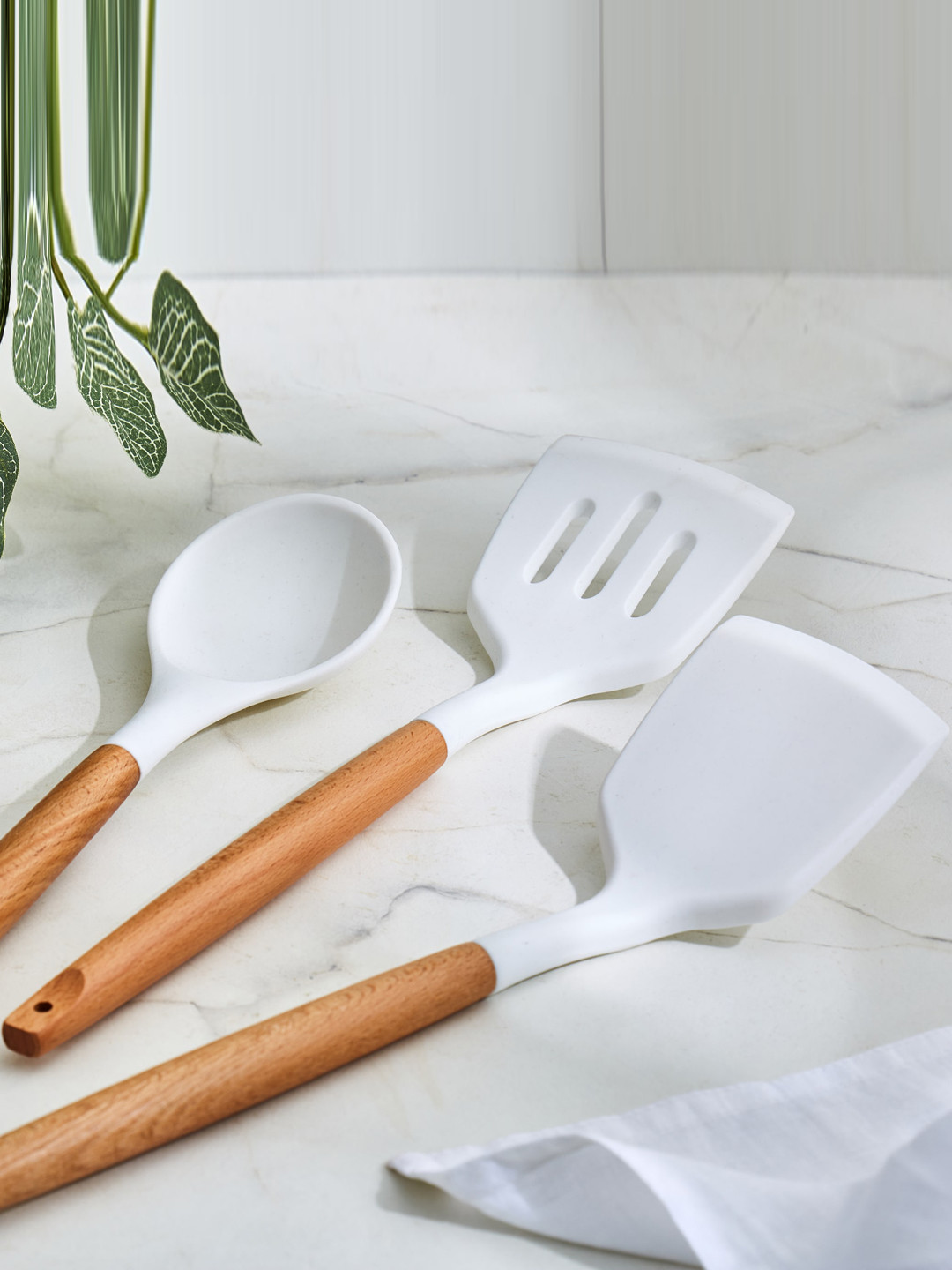 

Home Centre Marshmallow Aurba White Silicone Spoon With Wooden Handle