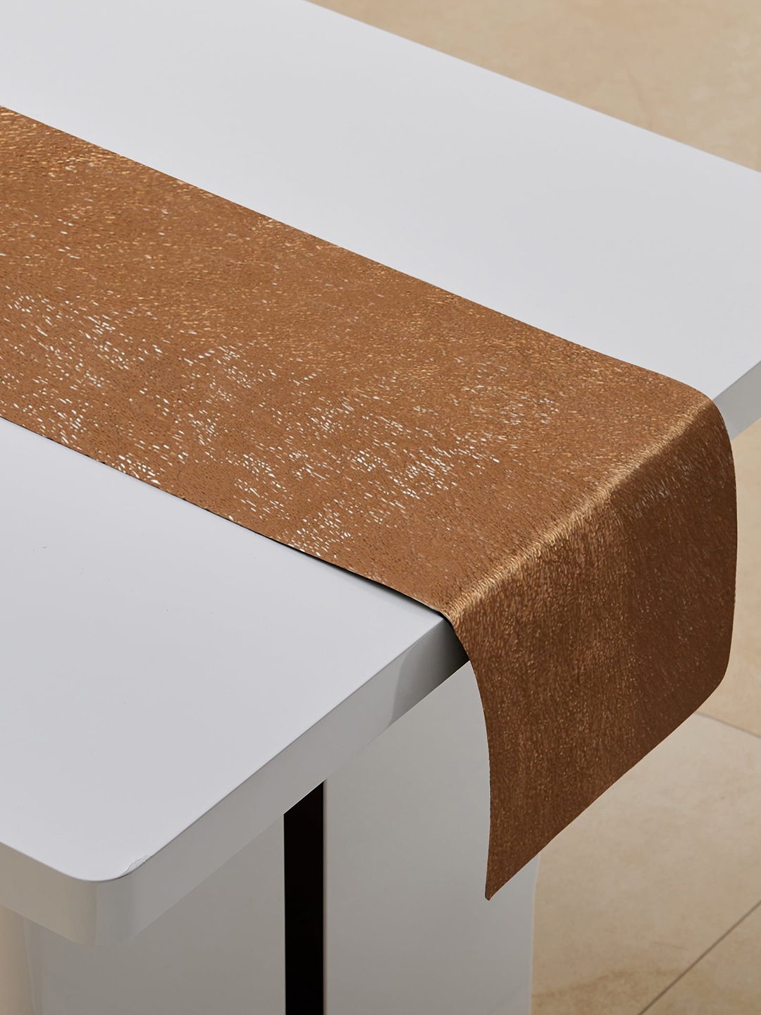 

Home Centre Cinder Brown Textured PVC Table Runner, Copper