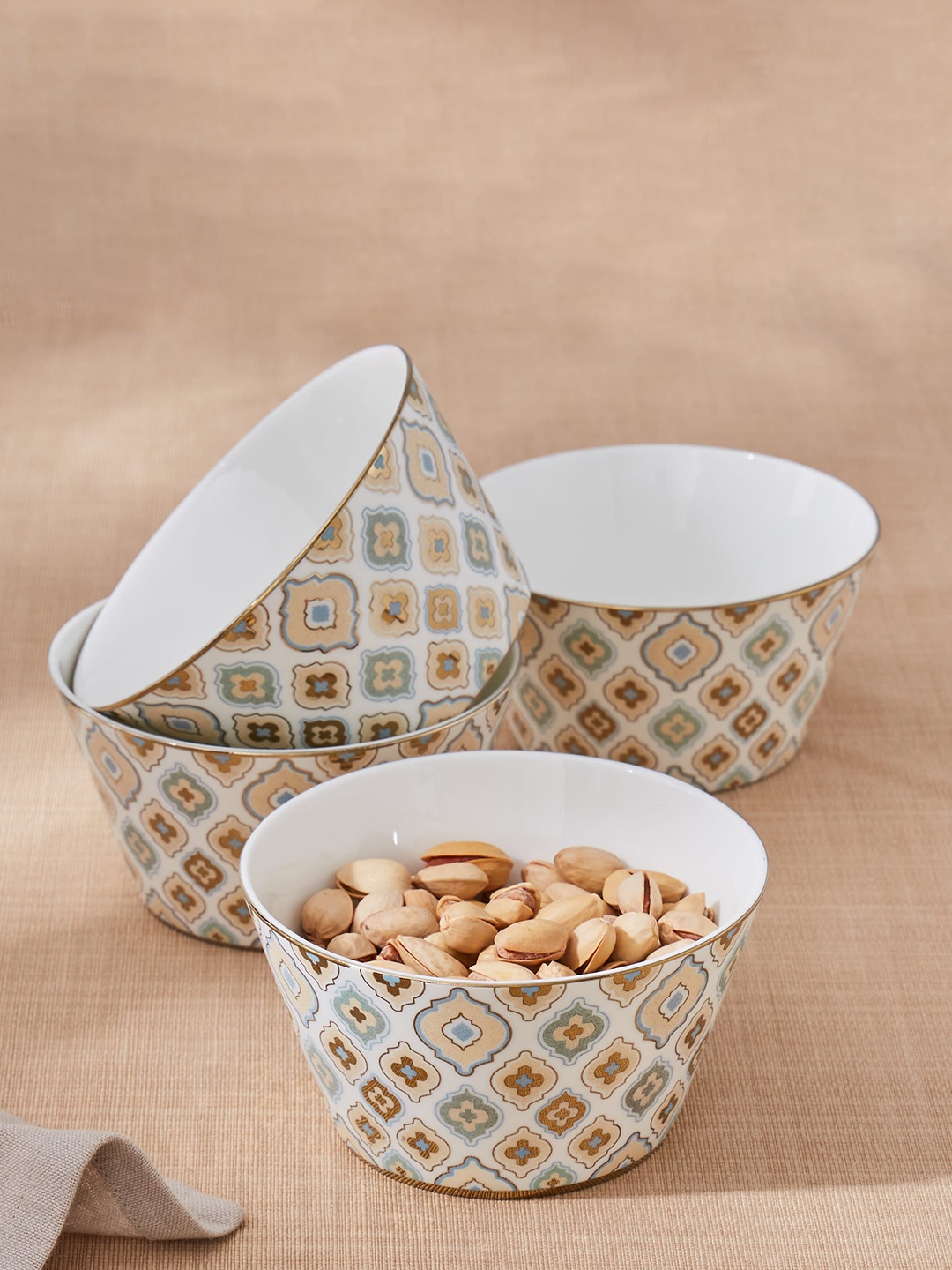 

Home Centre Corsica Ebony 4-Pcs White Printed China Bone Cereal Bowls - 480 ml