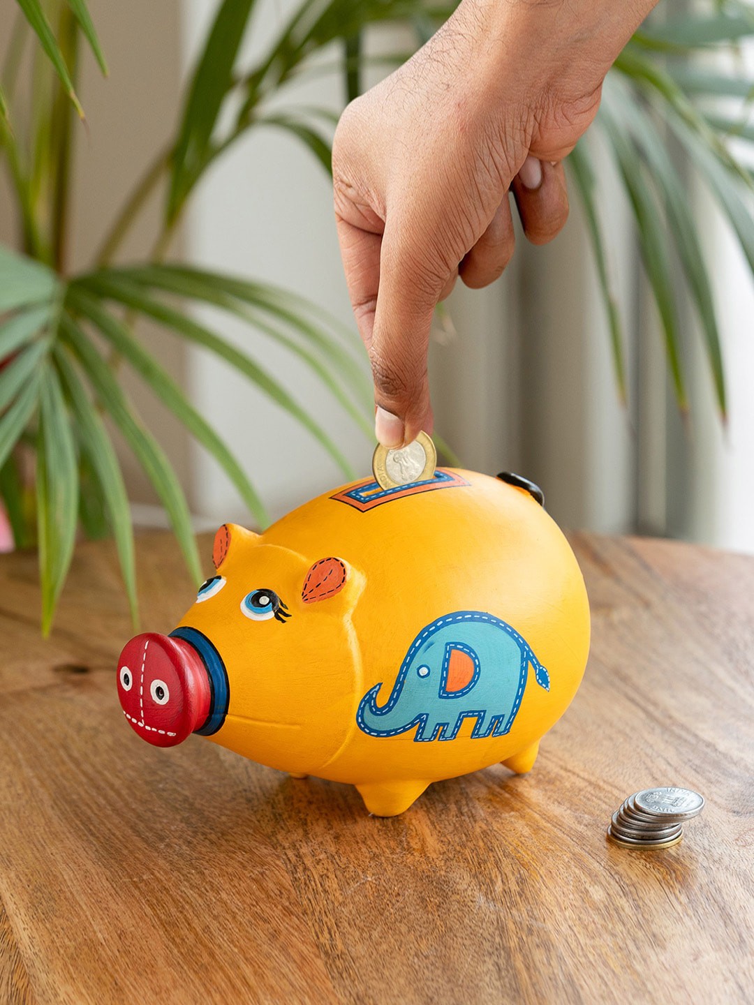

ExclusiveLane Yellow Terracotta Piggy Bank Hand Painted Showpiece