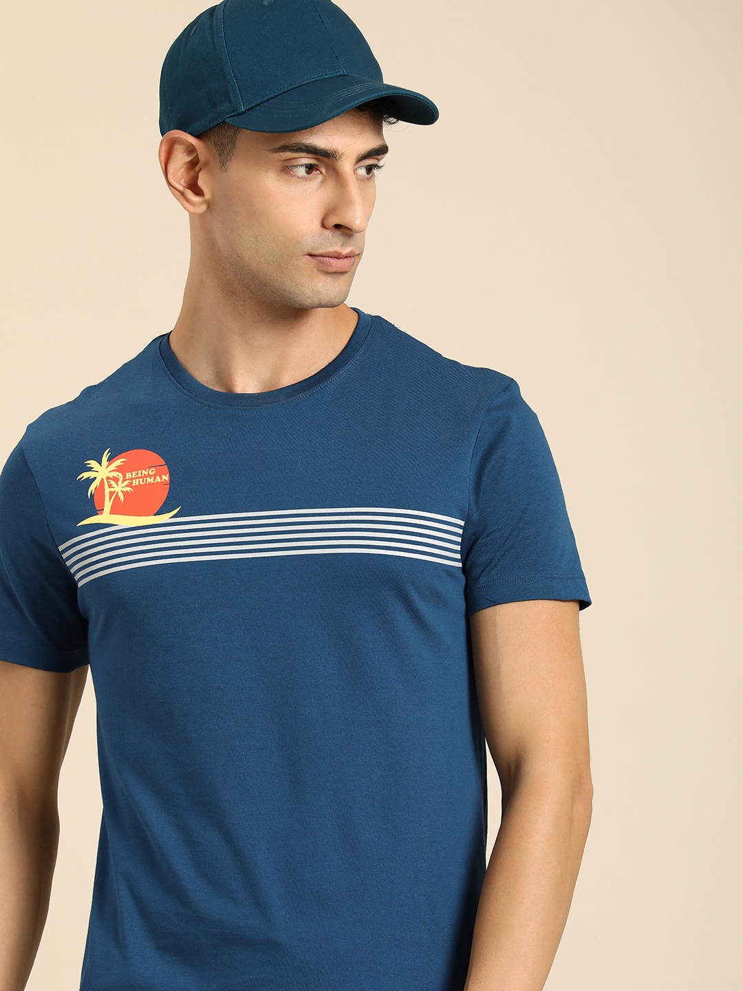 

Being Human Men Striped Pure Cotton T-shirt With Minimal Brand Logo & Graphic Print Detail, Navy blue