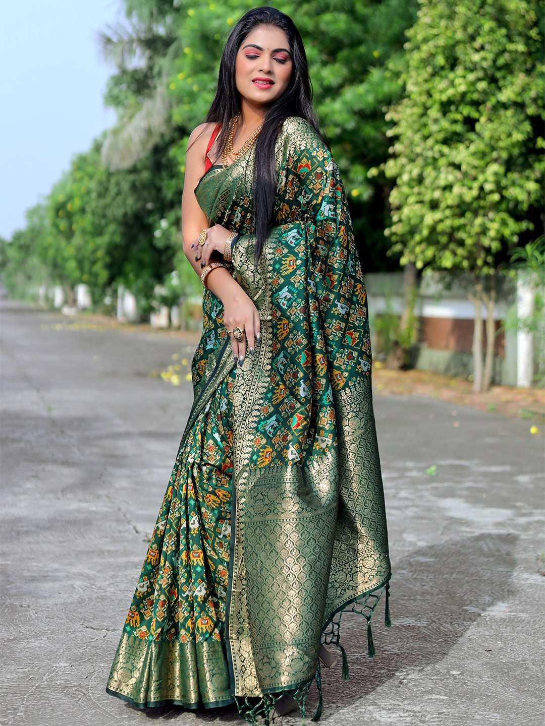 

Anouk Green Ethnic Motifs Woven Design Pure Silk Patola Saree