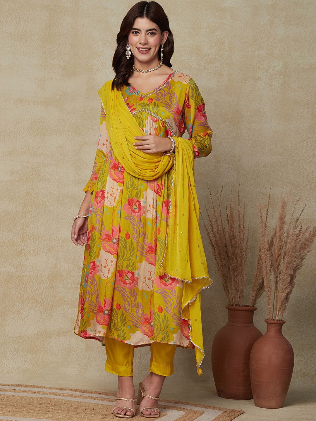 

FASHOR Yellow Floral Printed Empire A-Line Kurta & Trousers With Dupatta