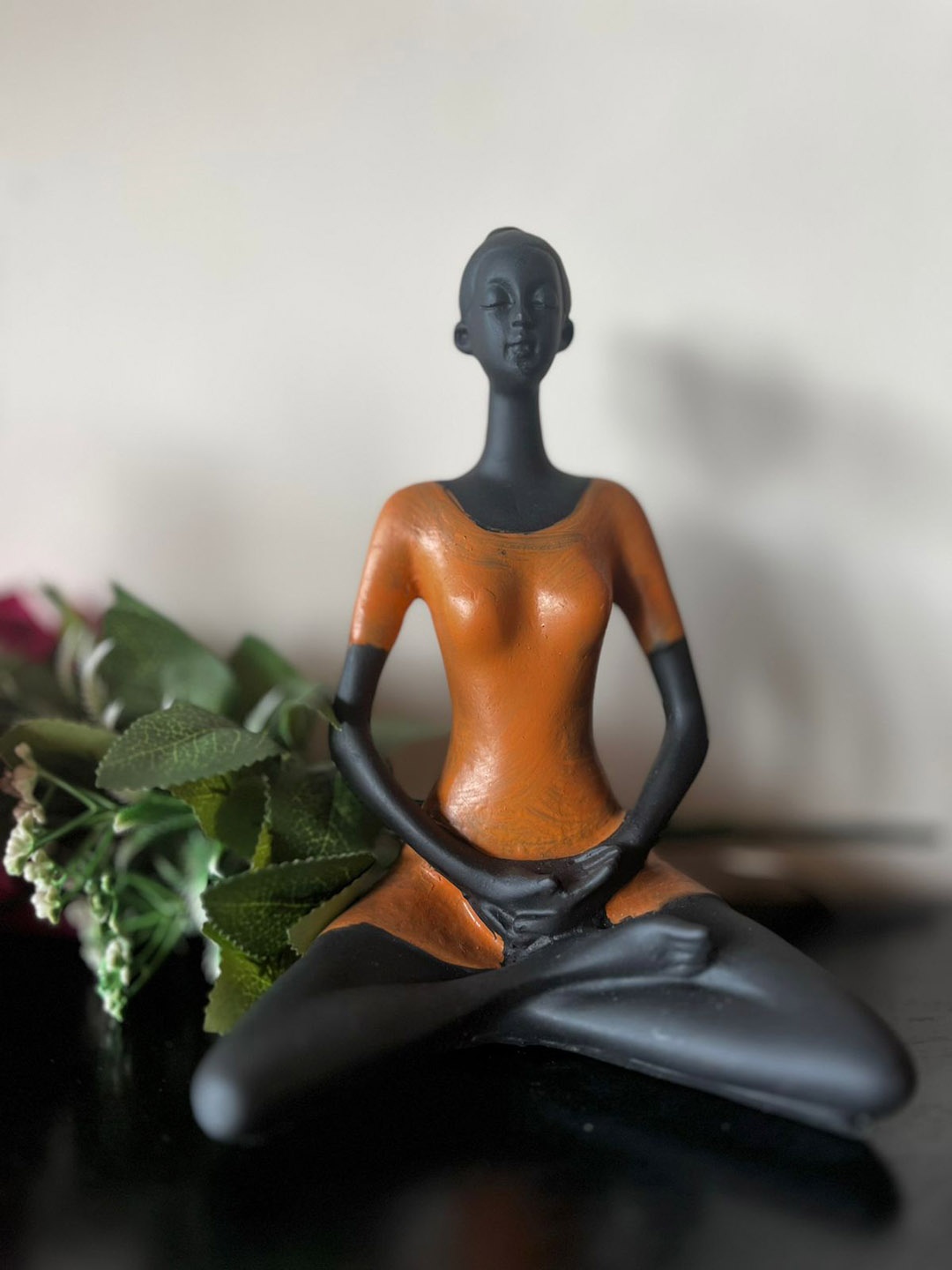 

ECLAT FURNISH Black & Orange Lady in Meditation Yoga Pose Figurine Showpiece