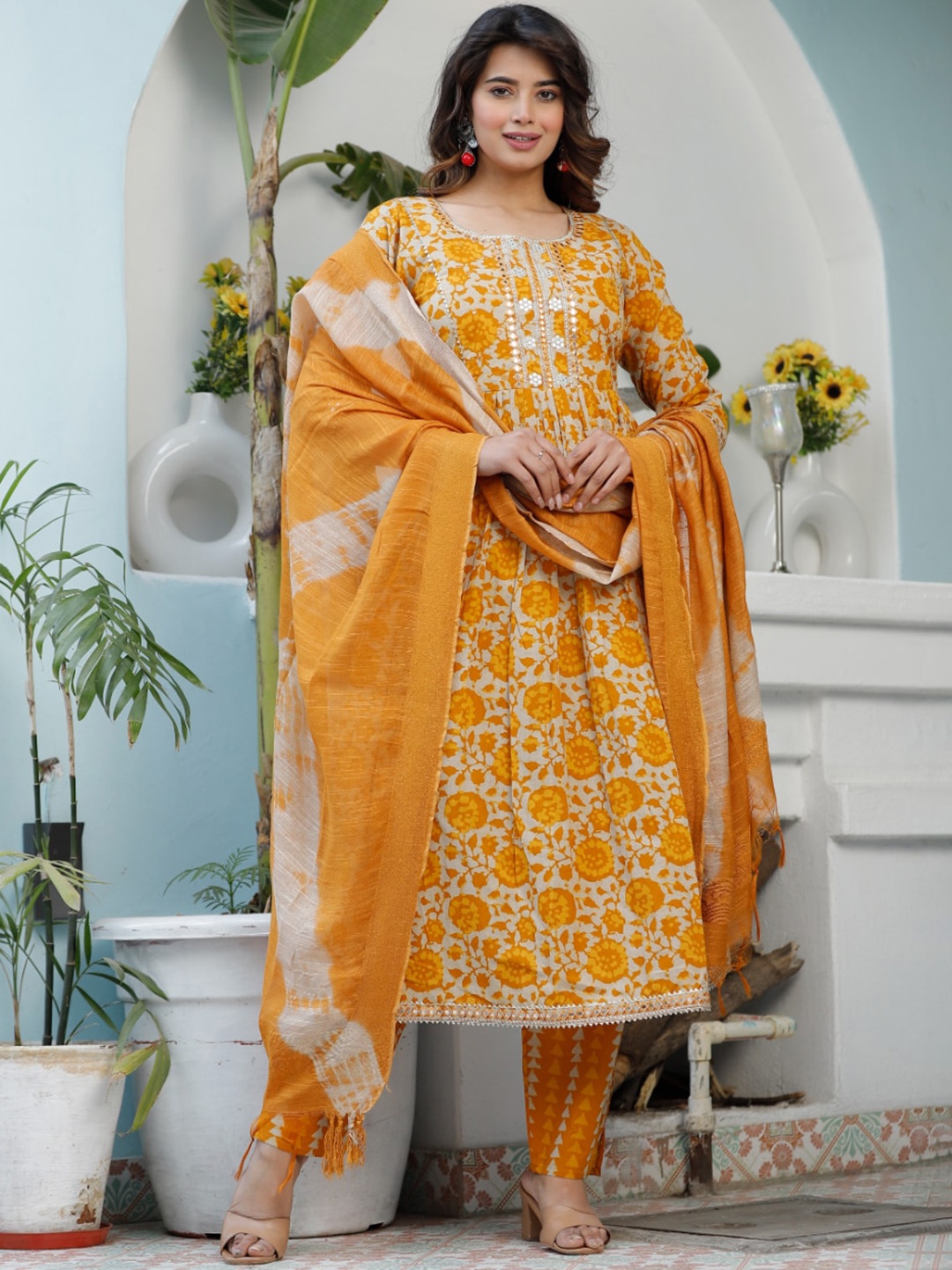 

HIGHLIGHT FASHION EXPORT Floral Printed Mirror Work Pure Cotton Kurta Set, Mustard