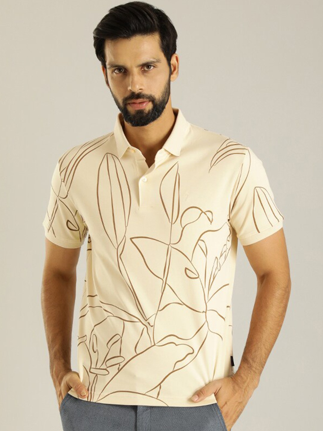 

Indian Terrain Abstract Printed Polo Collar Pure Cotton T-shirt, Cream