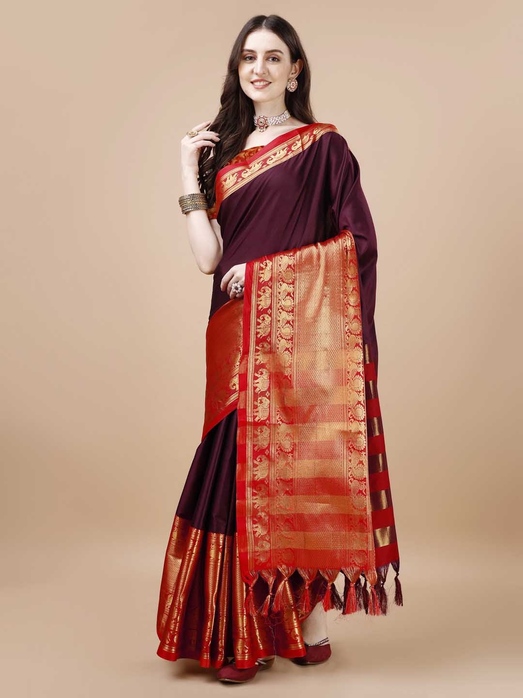 

Mitera Maroon & Red Ethnic Motifs Woven Design Zari Silk Cotton Banarasi Saree