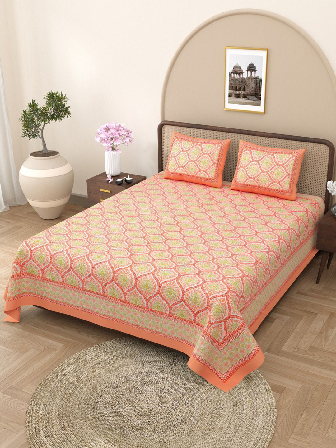 

RajasthaniKart Peach Ethnic Motifs Cotton 144 TC King Bedsheet with 2 Pillow Covers