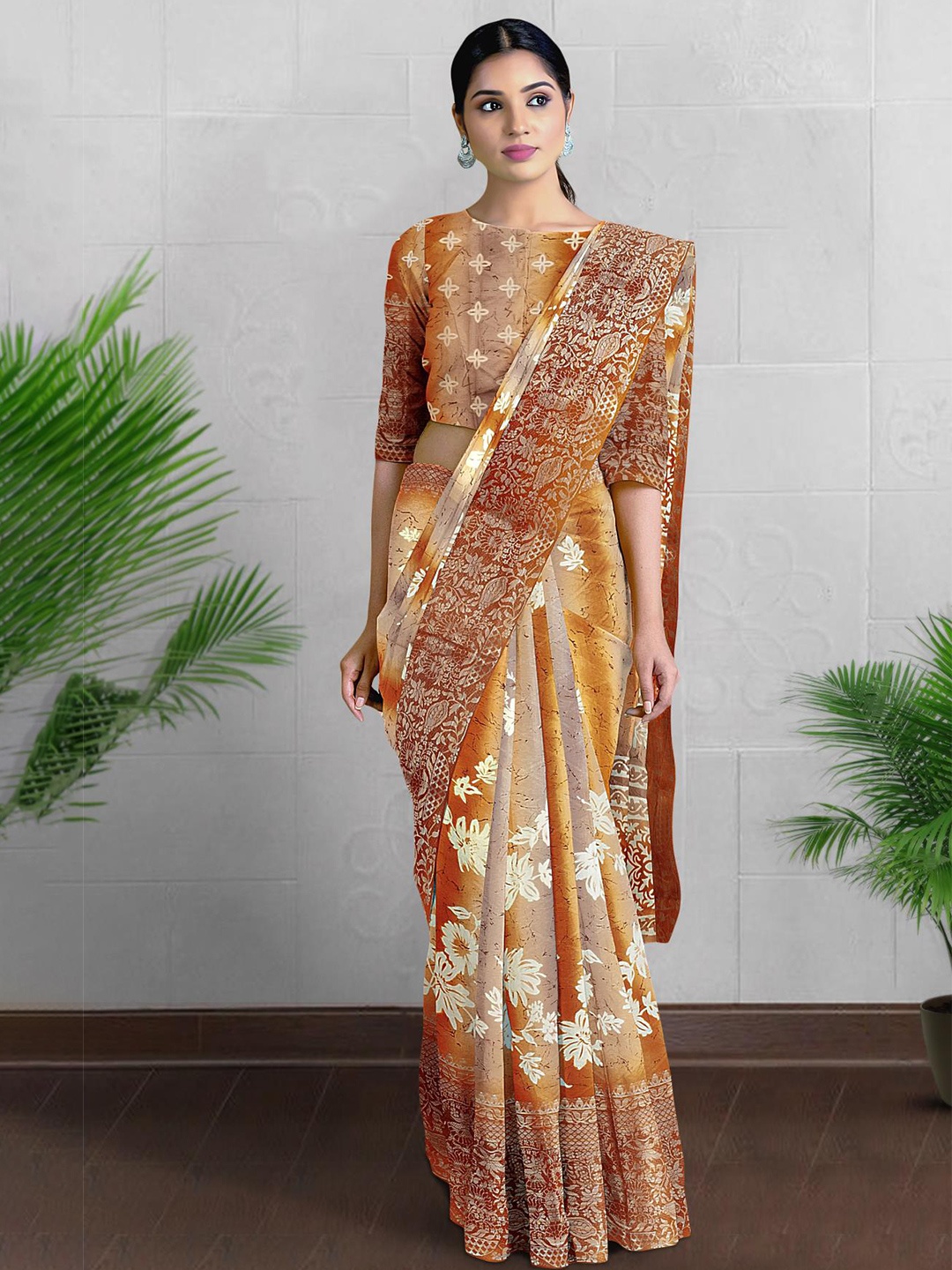 

Kalamandir Brown Floral Silk Blend Saree