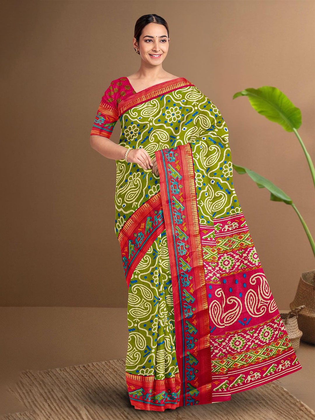 

Kalamandir Paisley Printed Zari Saree, Green