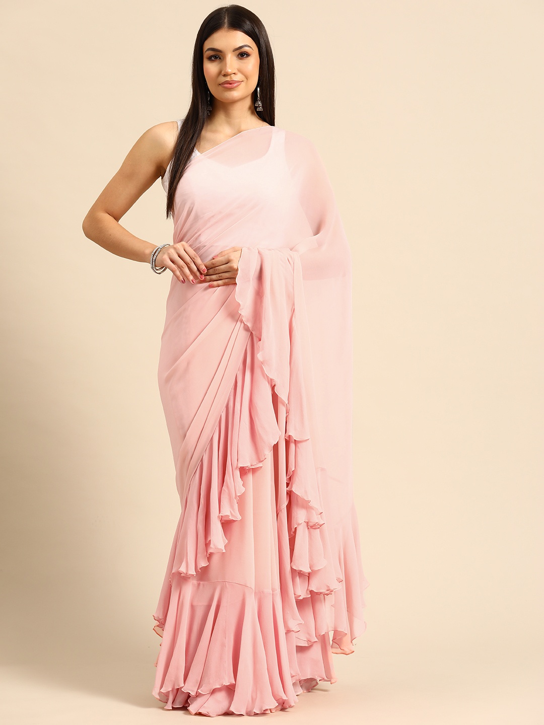 

Simaaya Solid Ruffled Pure Georgette Saree, Peach