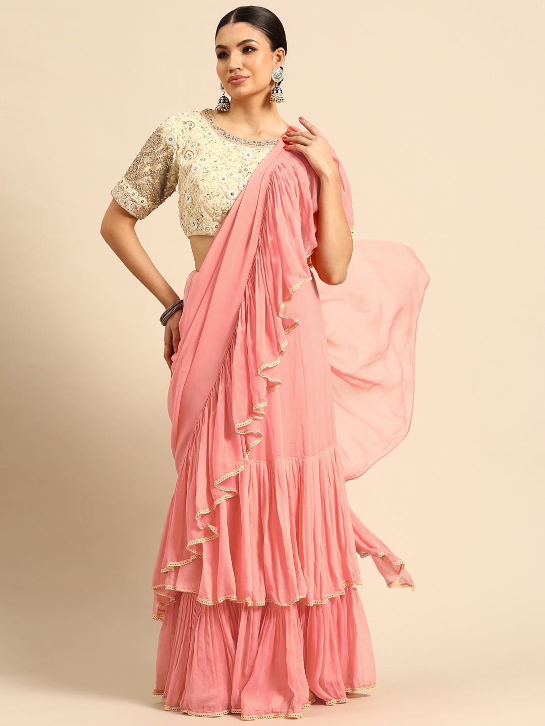 

Simaaya Solid Ruffles Pure Georgette Saree, Peach