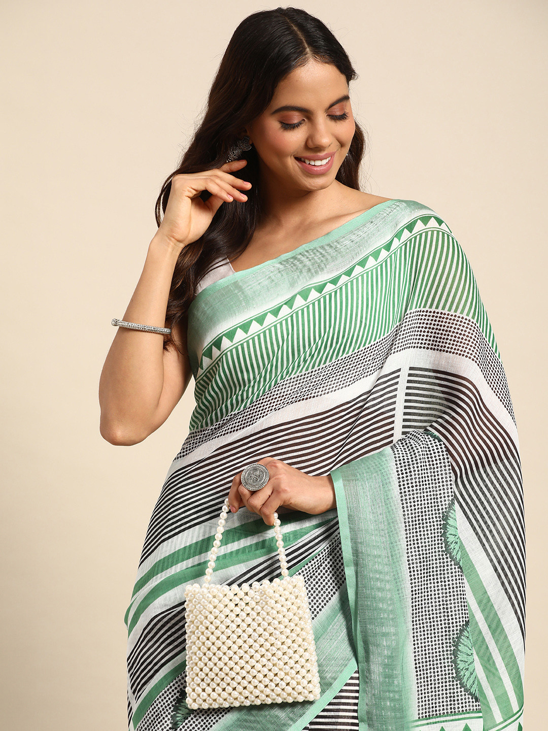 

Kalyan Silks Striped Pure Linen Taant Saree, White