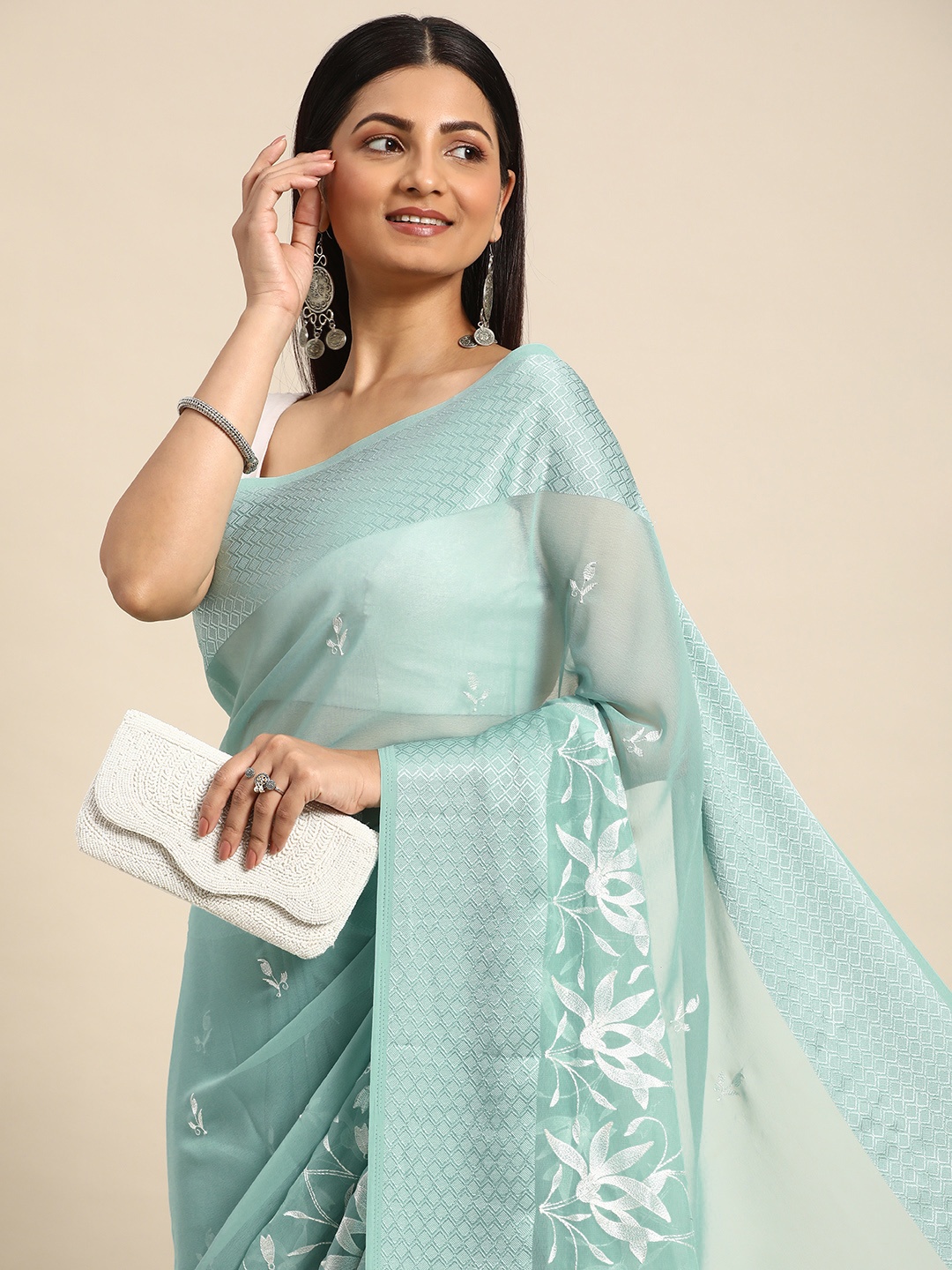 

Kalyan Silks Floral Embroidered Pure Georgette Chanderi Saree, Turquoise blue