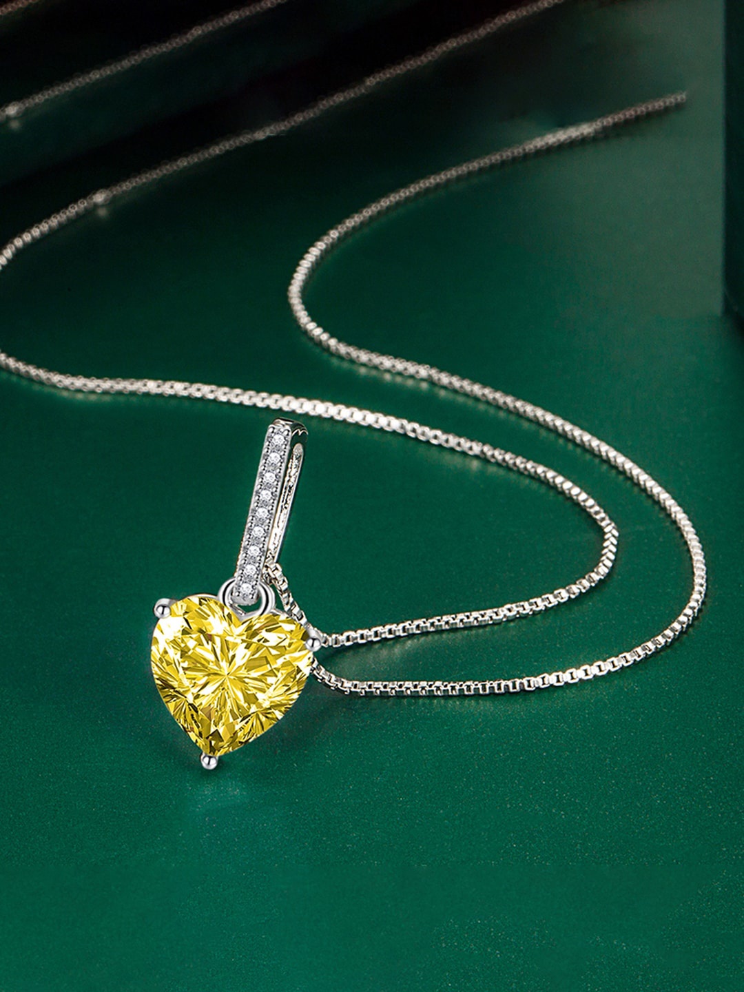 

Designs & You Silver-Plated CZ Stone Studded Heart Shape Pendant With Chain