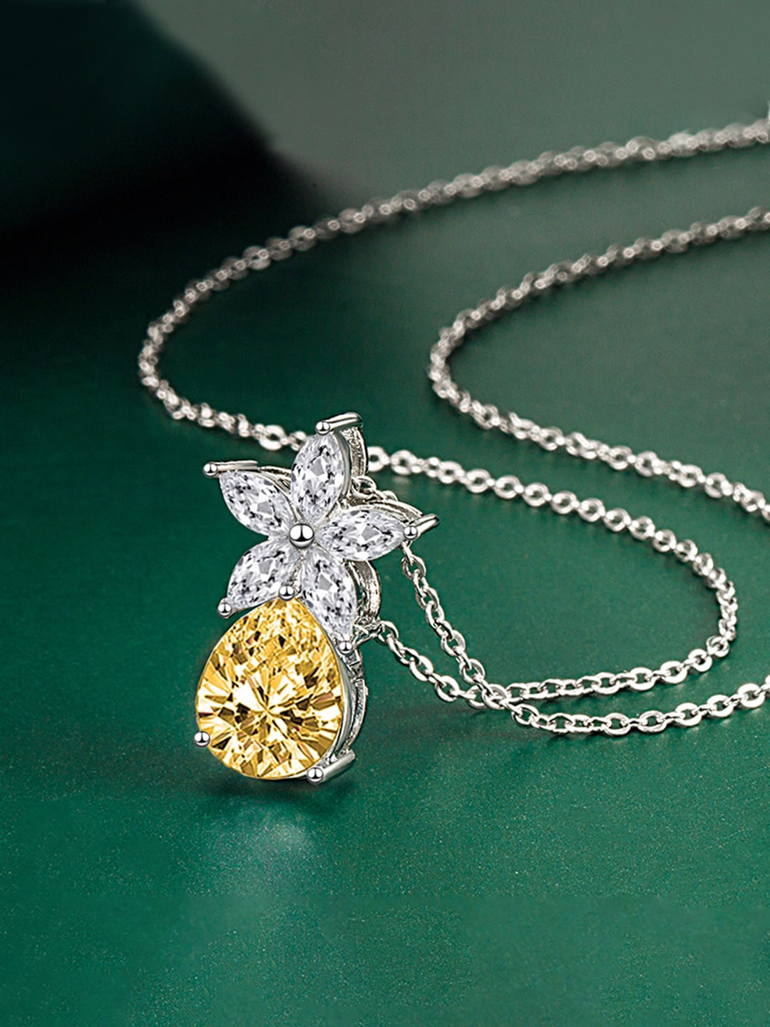 

Designs & You Silver-Plated CZ Studded Pendant With Chain
