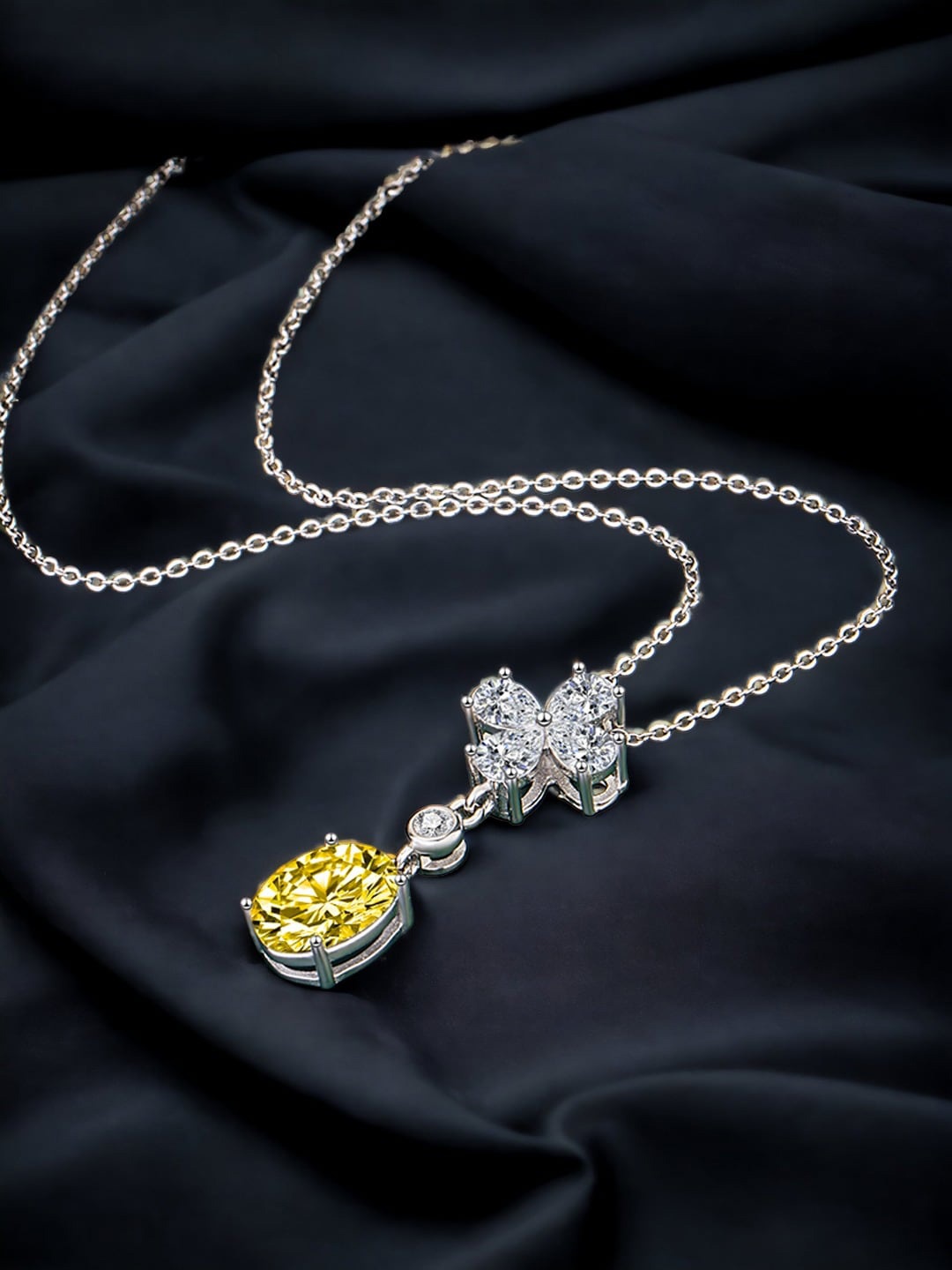

Designs & You Silver Plated Cubic Zirconia Studded Pendant With Chain