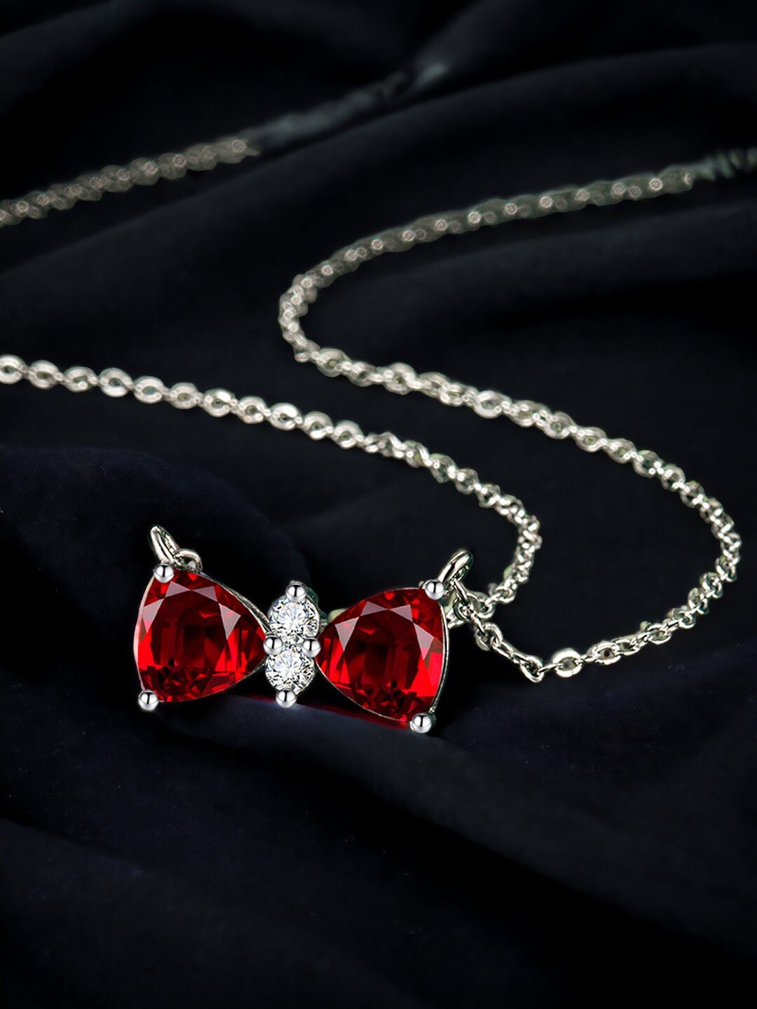 

Designs & You Silver-Plated Cubic Zirconia Studded Bow Shaped Necklace