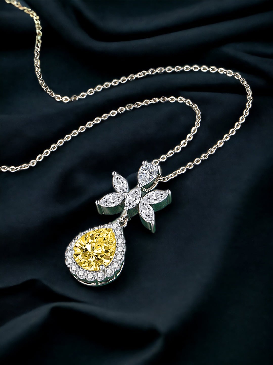 

Designs & You Silver Plated Cubic Zirconia Studded Pendant With Chain