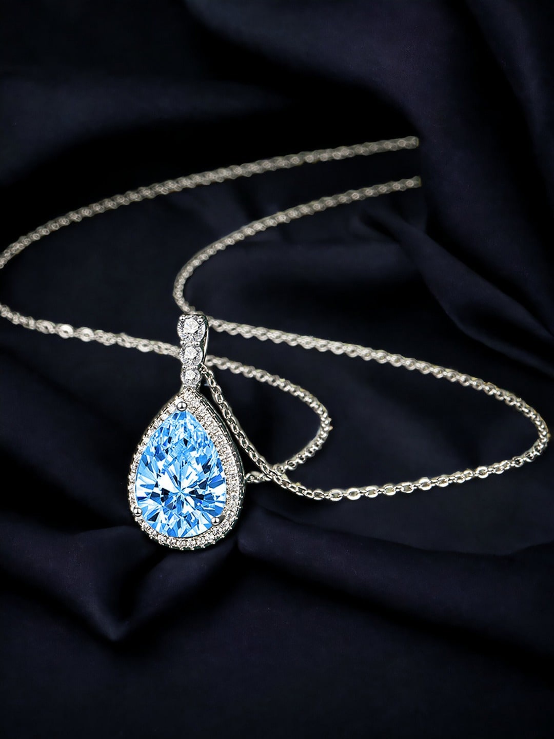 

Designs & You Silver-Plated Cubic Zirconia-Studded Teardrop Shaped Pendant With Chain
