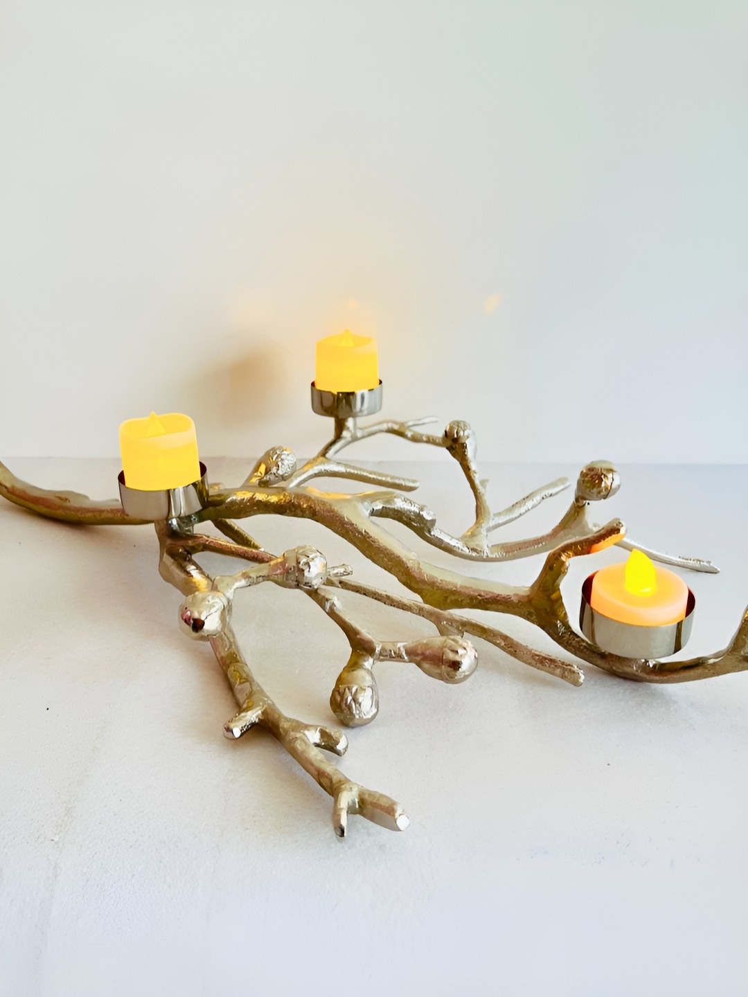 

Timaya's Decor Silver-Toned Candle Holder