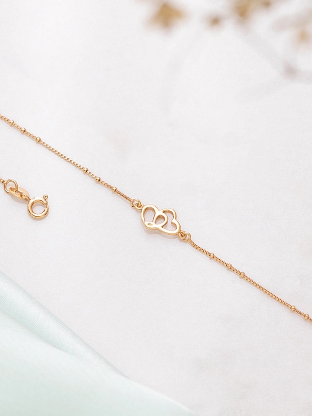 

Zavya Women Sterling Silver Rose Gold-Plated Link Bracelet