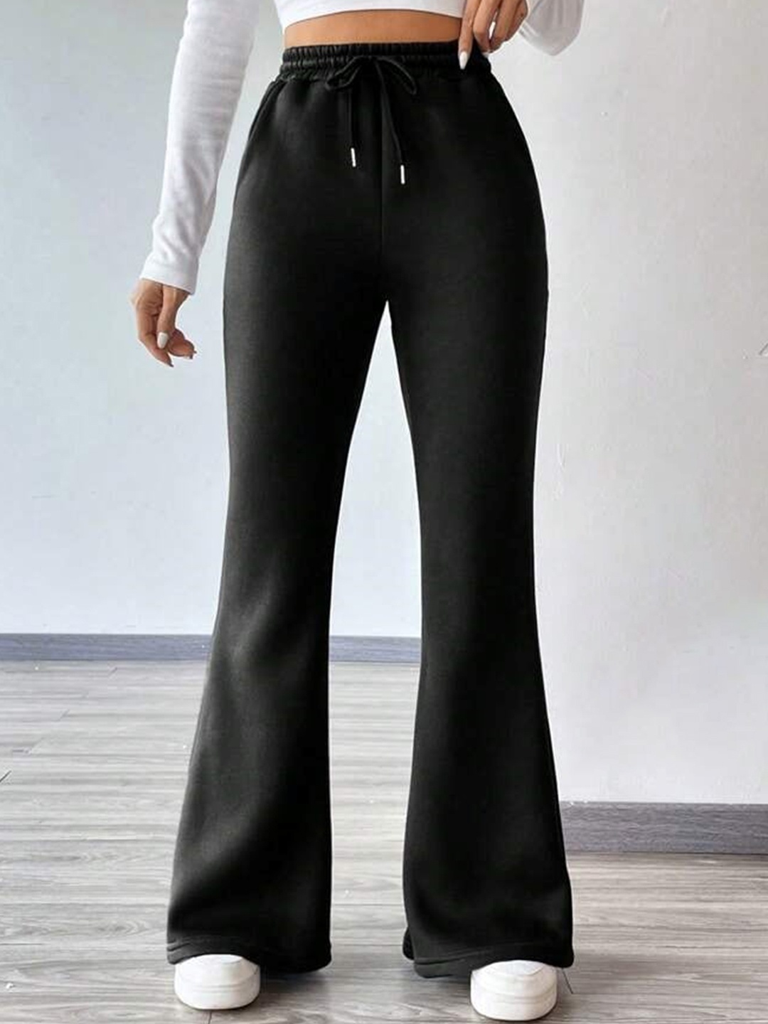 

StyleAsh Women Black Smart Flared High-Rise Trousers