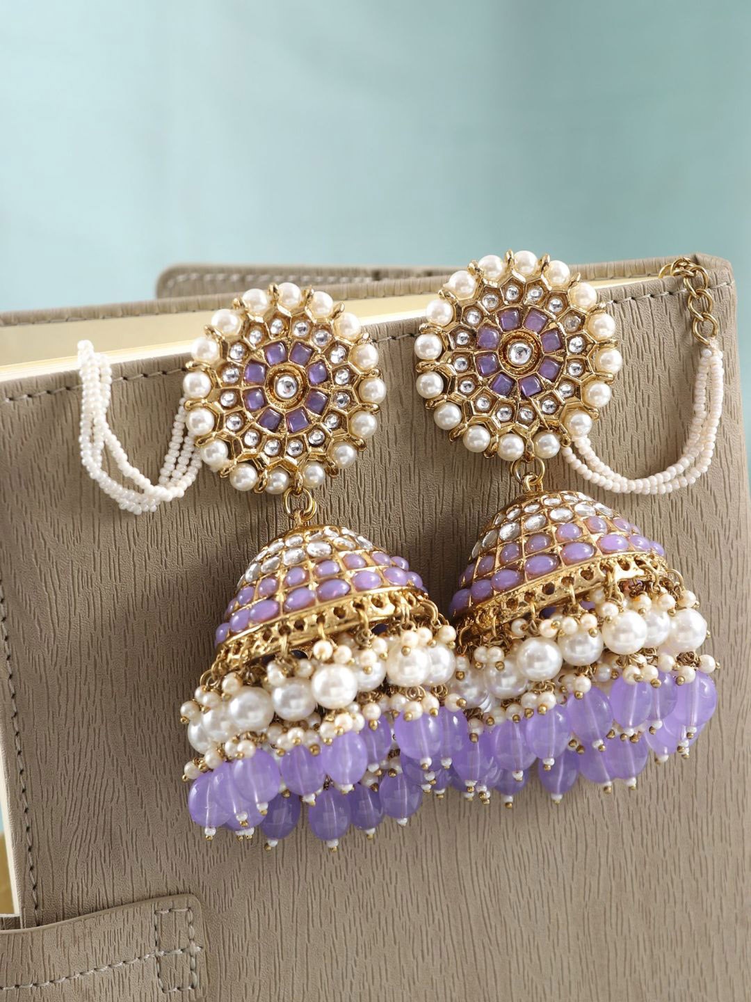 

Crunchy Fashion Gold-Plated Artificial Stones & Beads Jhumkas Earrings With Ear Chain