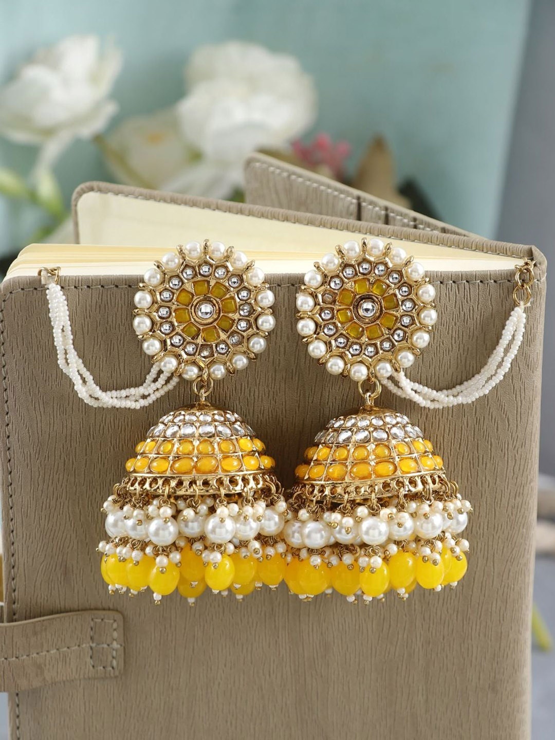 

Crunchy Fashion Gold-Plated Artificial Stones & Beads Jhumkas Earrings With Ear Chain, Yellow