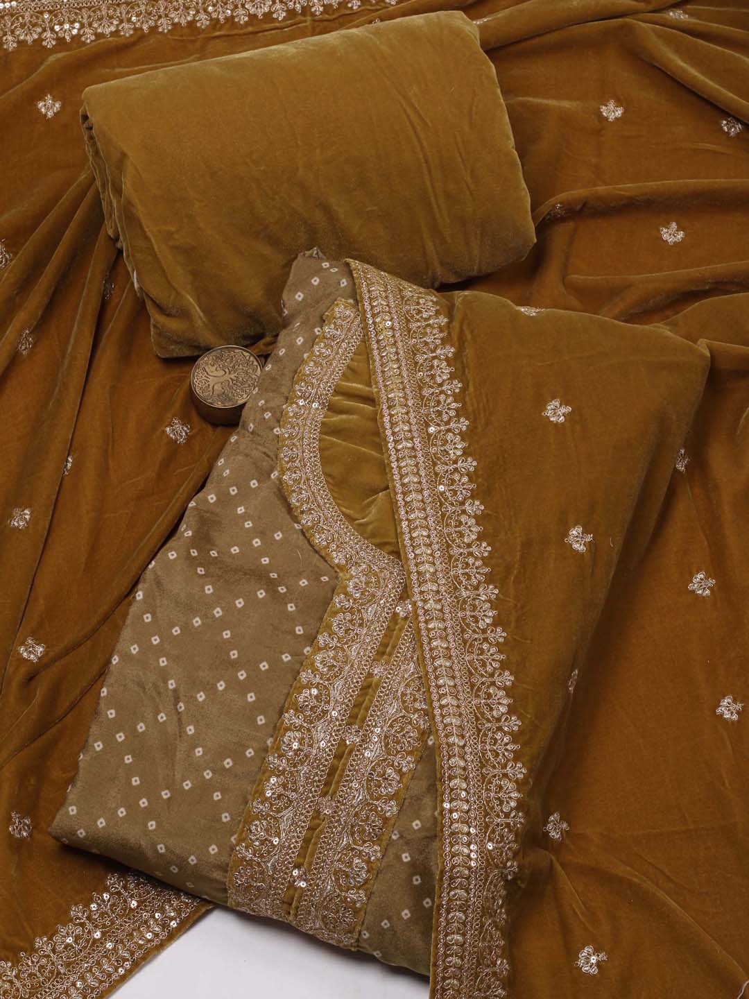 

Meena Bazaar Bandhani Printed Beads and Stones Velvet Unstitched Dress Material, Mustard