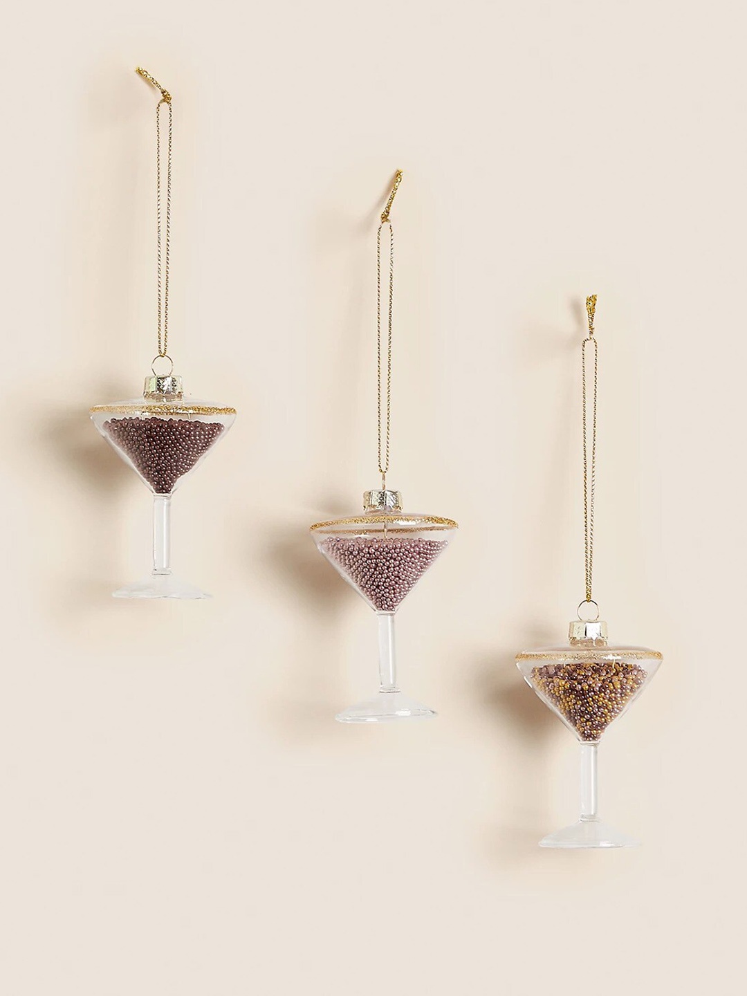 

Marks & Spencer Transparent & Gold-Toned 2 Pieces Cocktail Glass Hanging Wall Decors