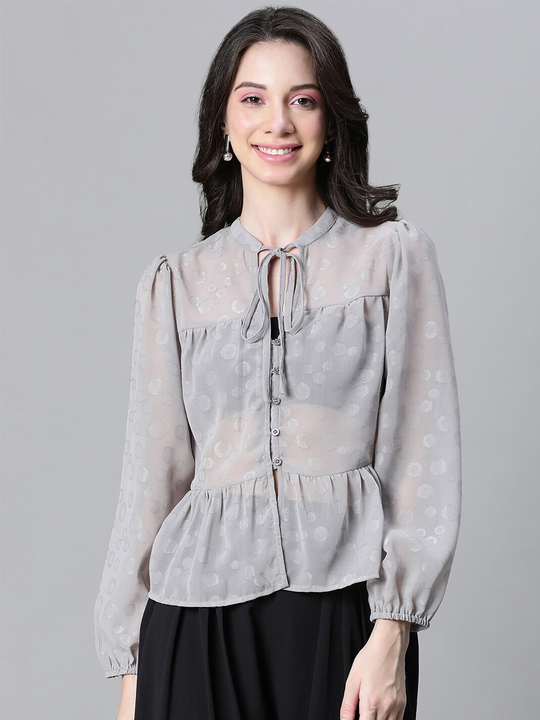 

Oxolloxo Polka Dots Self Design Tie-Up Neck Puff Sleeves Gathered Dobby Sheer Top, Grey