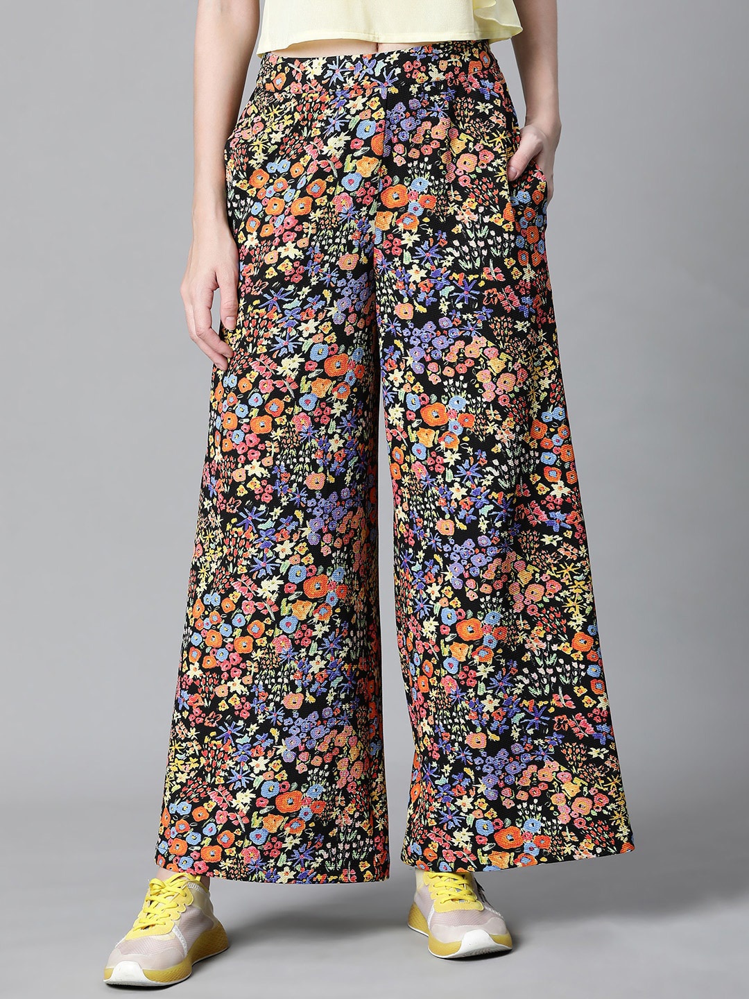 

Oxolloxo Women Black Floral Printed Flared Easy Wash Trousers
