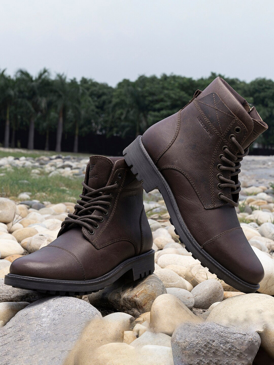 

Red Tape Men Textured Anti-Slip Ground Support Leather Mid-Top Regular Boots, Brown