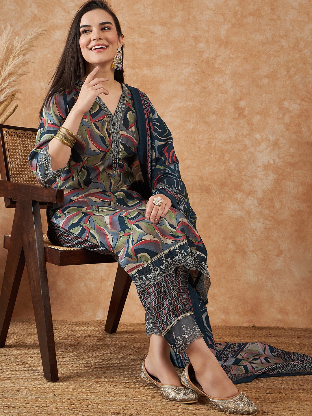 

Sangria Abstract Printed V-Neck Thread Work Kurta With Trouser & Dupatta, Navy blue