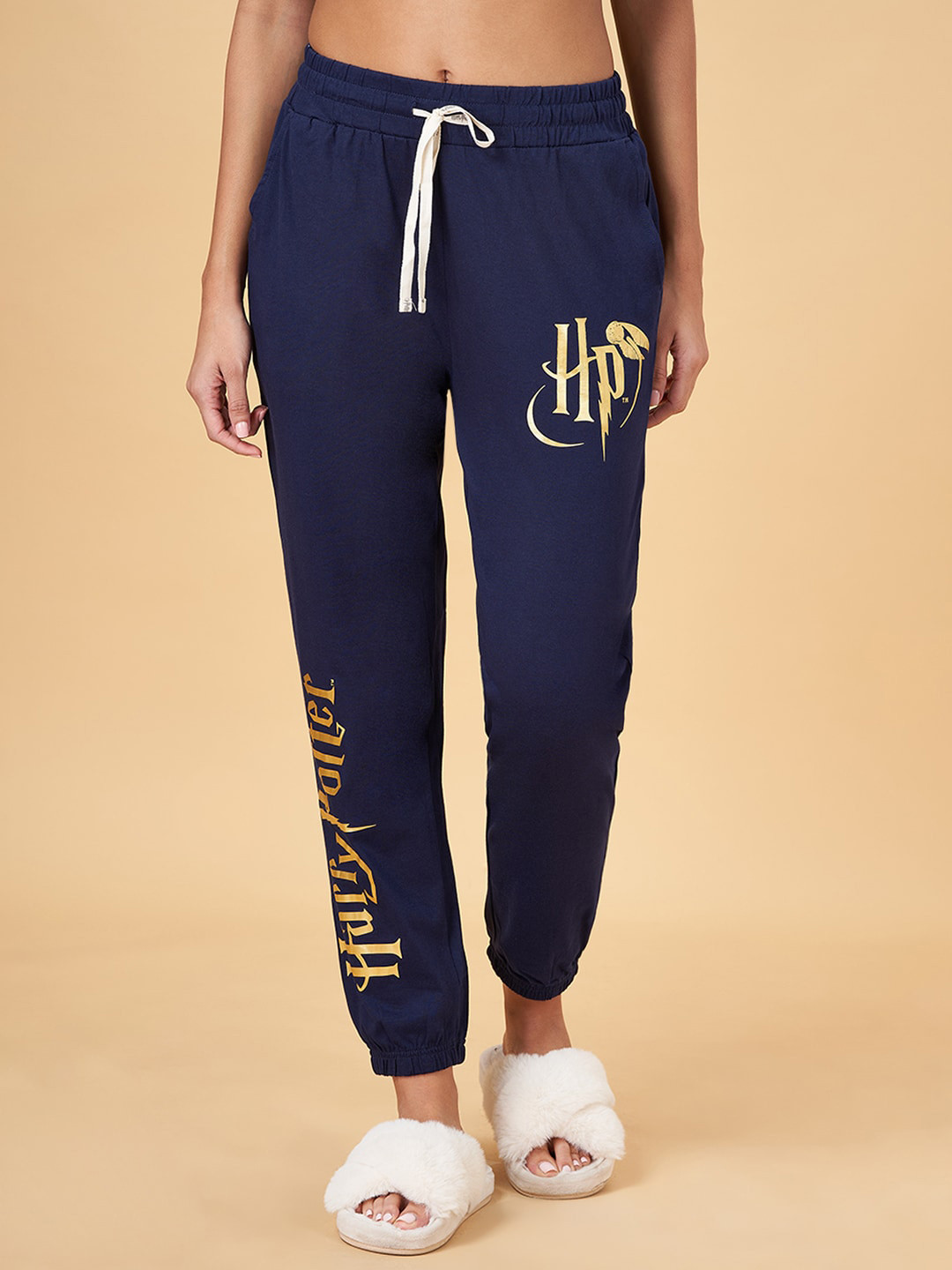 

Dreamz by Pantaloons Women Harry Potter Printed Relaxed-Fit Mid-Rise Cotton Joggers, Navy blue