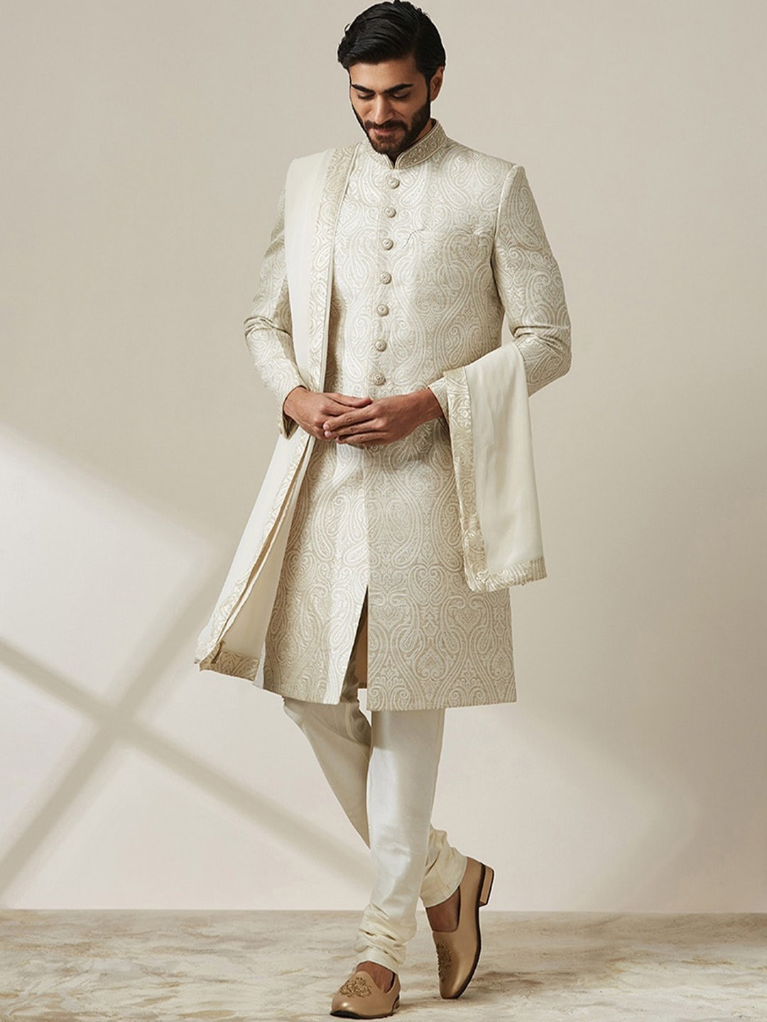 

Twamev Self Design Brocade Sherwani Set, Beige