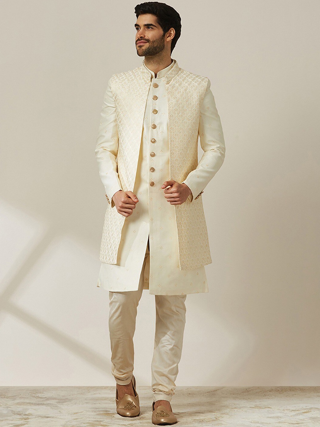 

Twamev Self Design Mandarin Collar Raw Silk Sherwani Set, Cream