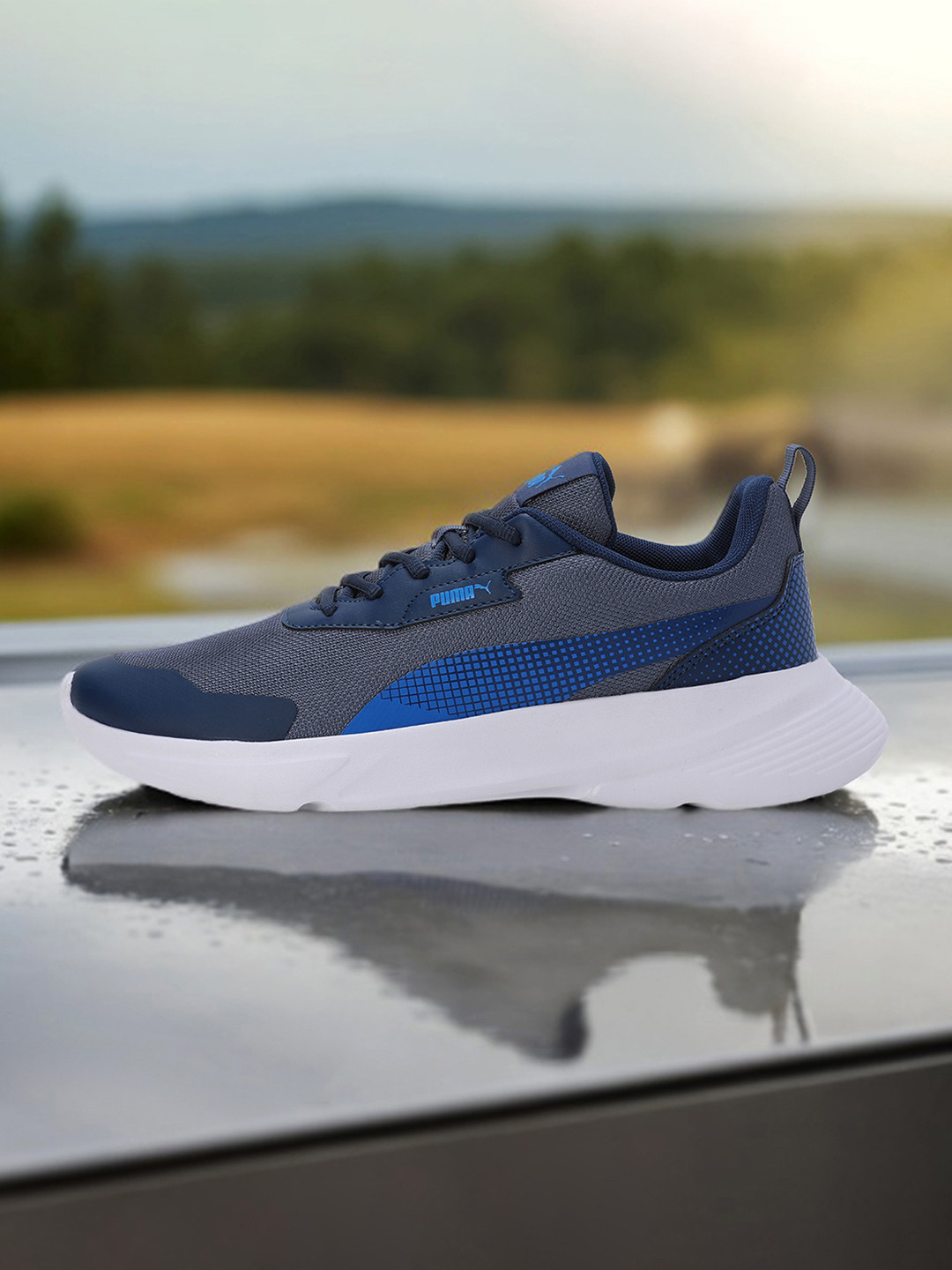 

Puma Men Voltige Sneakers, Blue
