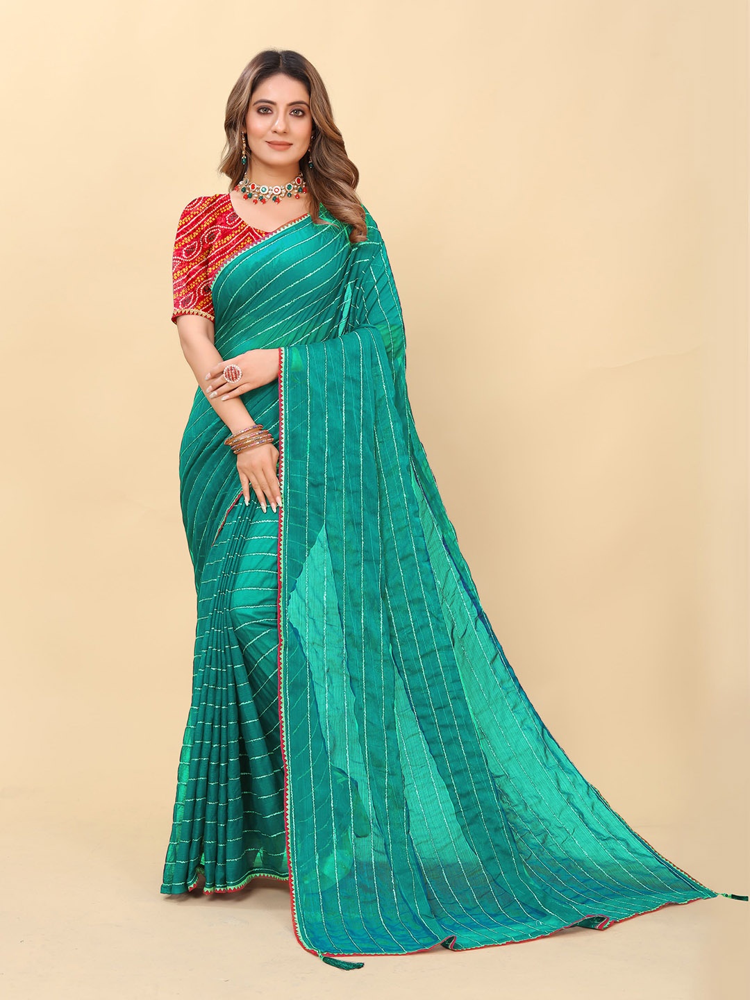 

ZELZIS Striped Saree, Sea green