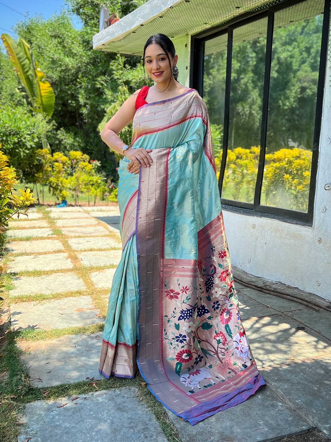 

Mitera Blue Ethnic Motif Woven Design Zari Paithani Saree
