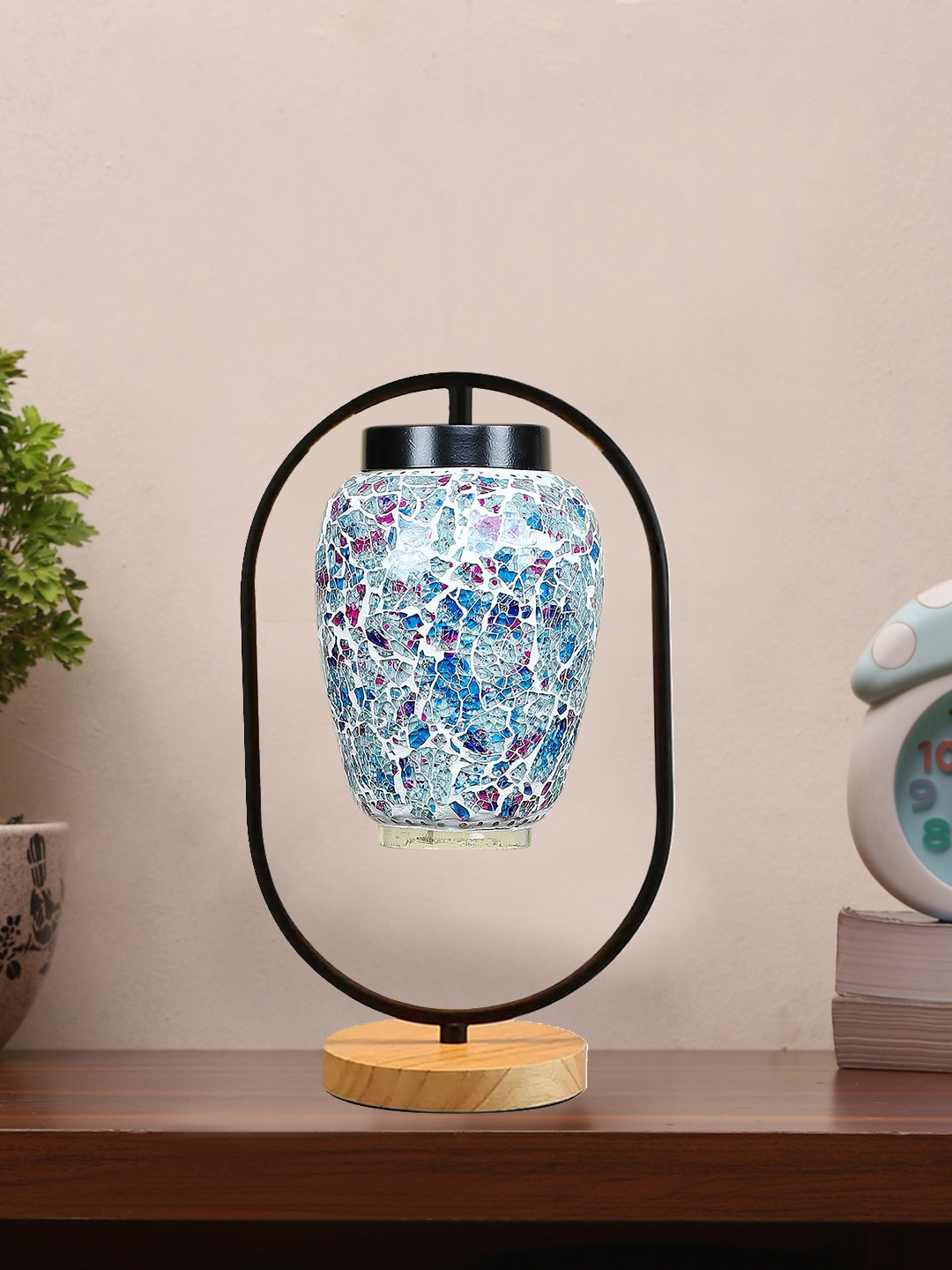 

Devansh Blue & White Abstract Glass Wooden & Iron Table Lamp