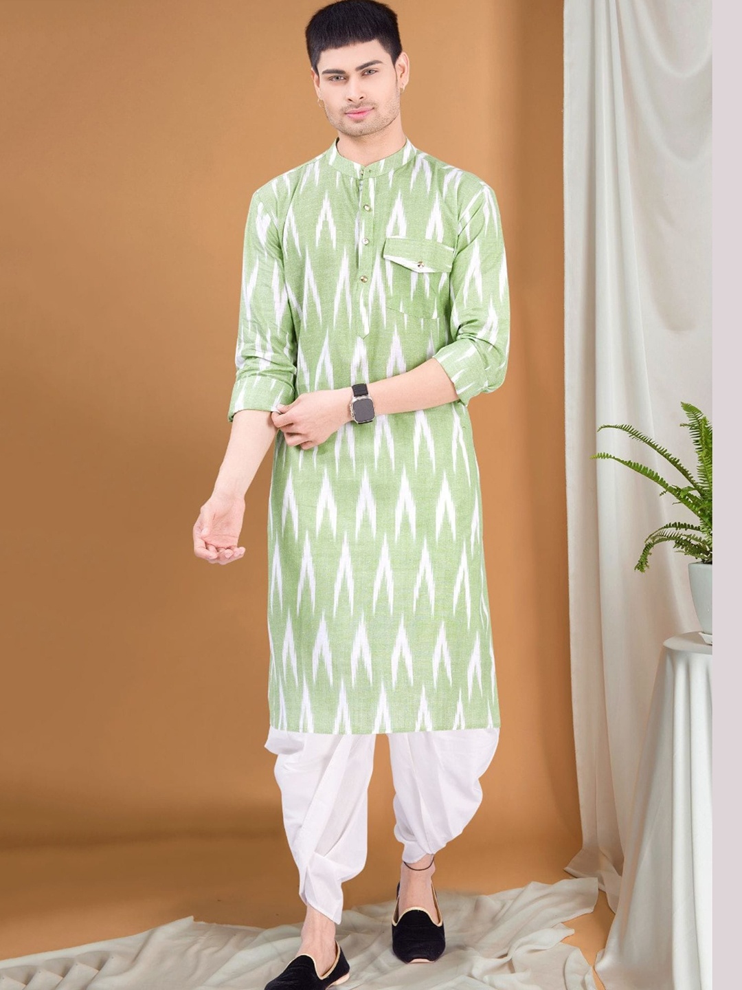 

SHIWAM ETHNIX Geometric Printed Mandarin Collar Ikat Kurta With Dhoti Pants, Green