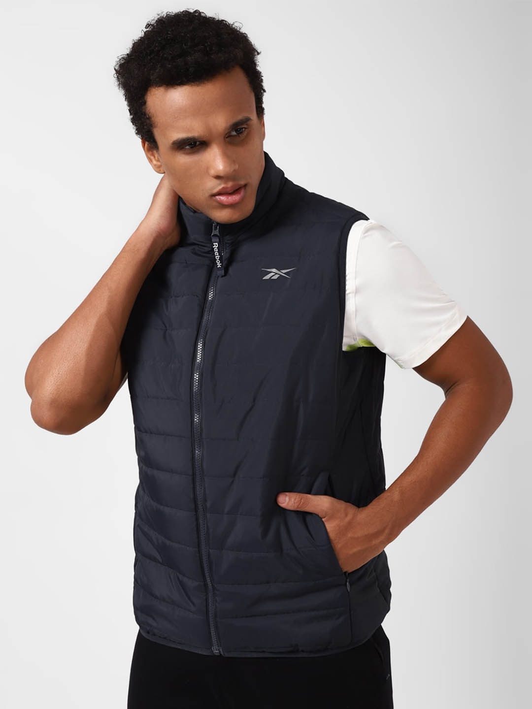 

Reebok Ease Sleeveless Stand Collar Padded Jackets, Navy blue