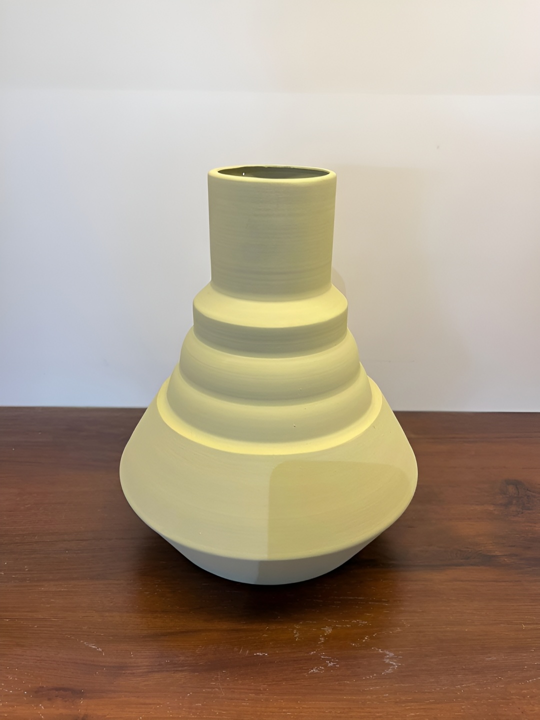 

The Artage Beige Metal Pyramid Vase Showpiece