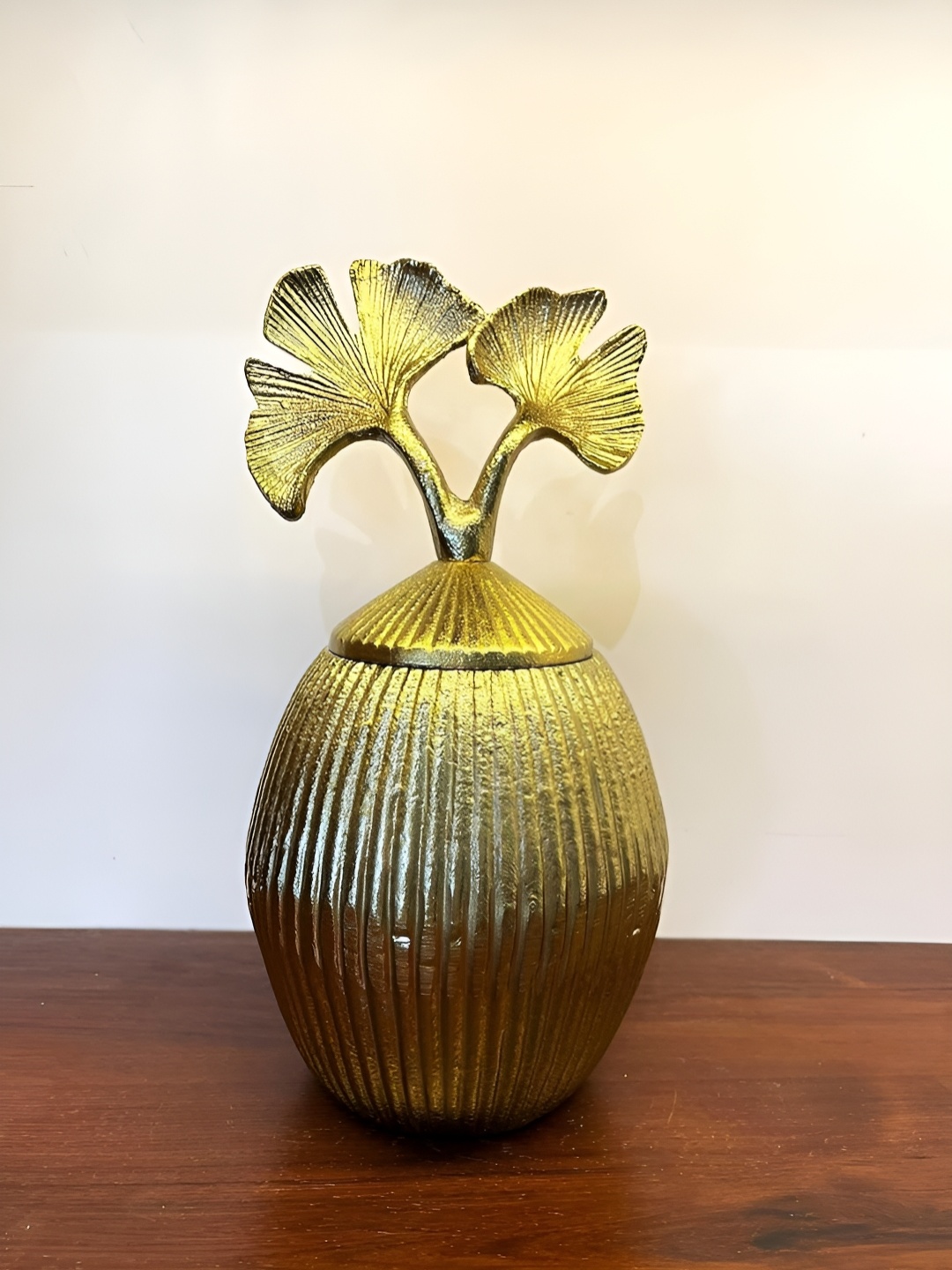 

The Artage Gold Toned Cylindrical Metal Vase