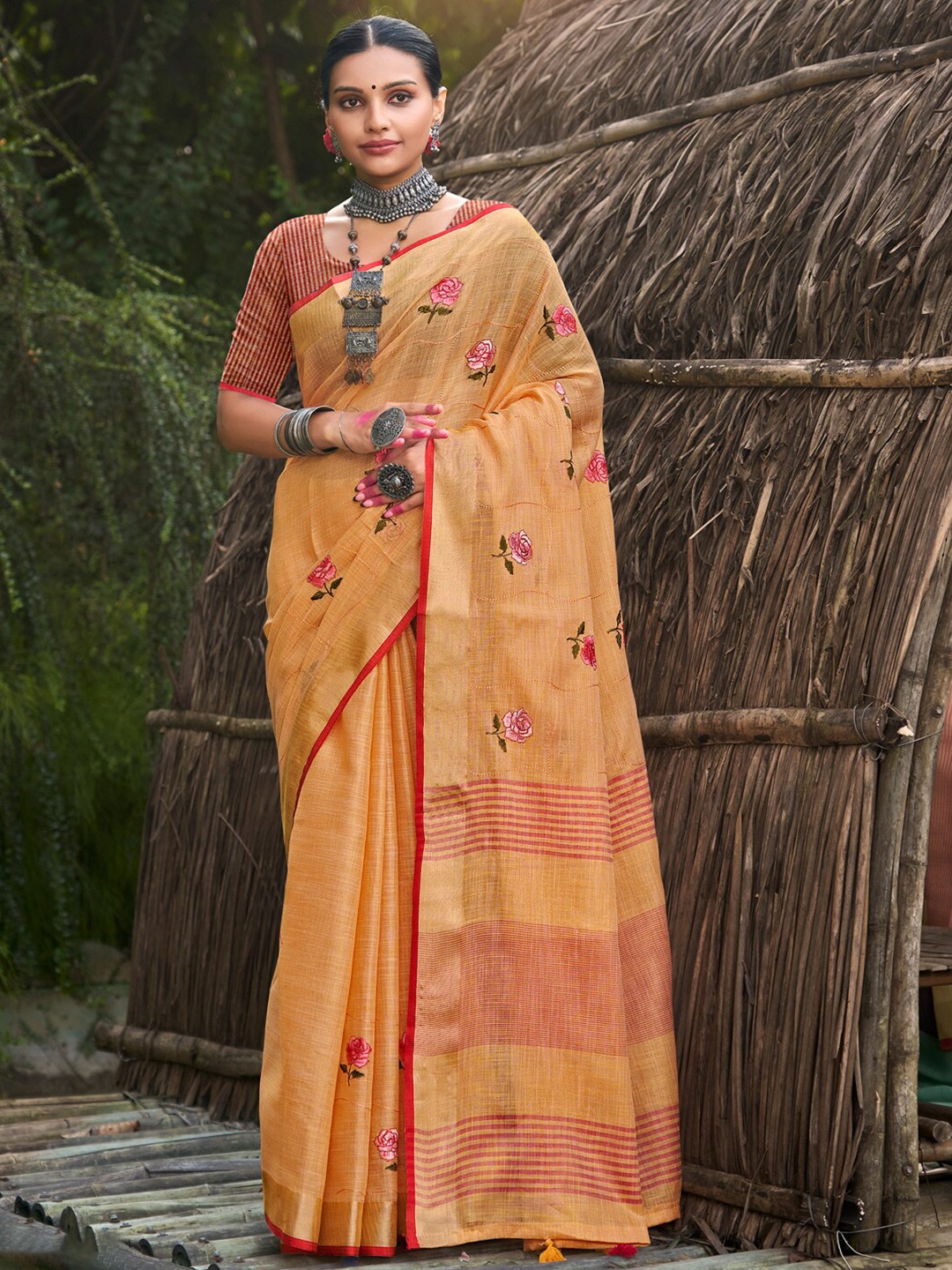 

Mitera Orange Floral Embroidered Zari Saree