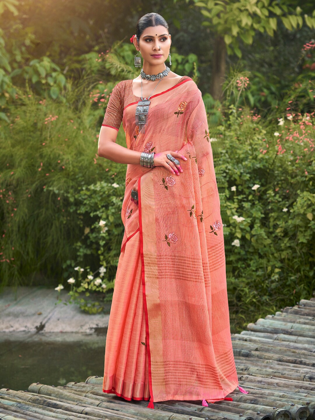 

Mitera Peach-Coloured Floral Embroidered Linen Blend Saree