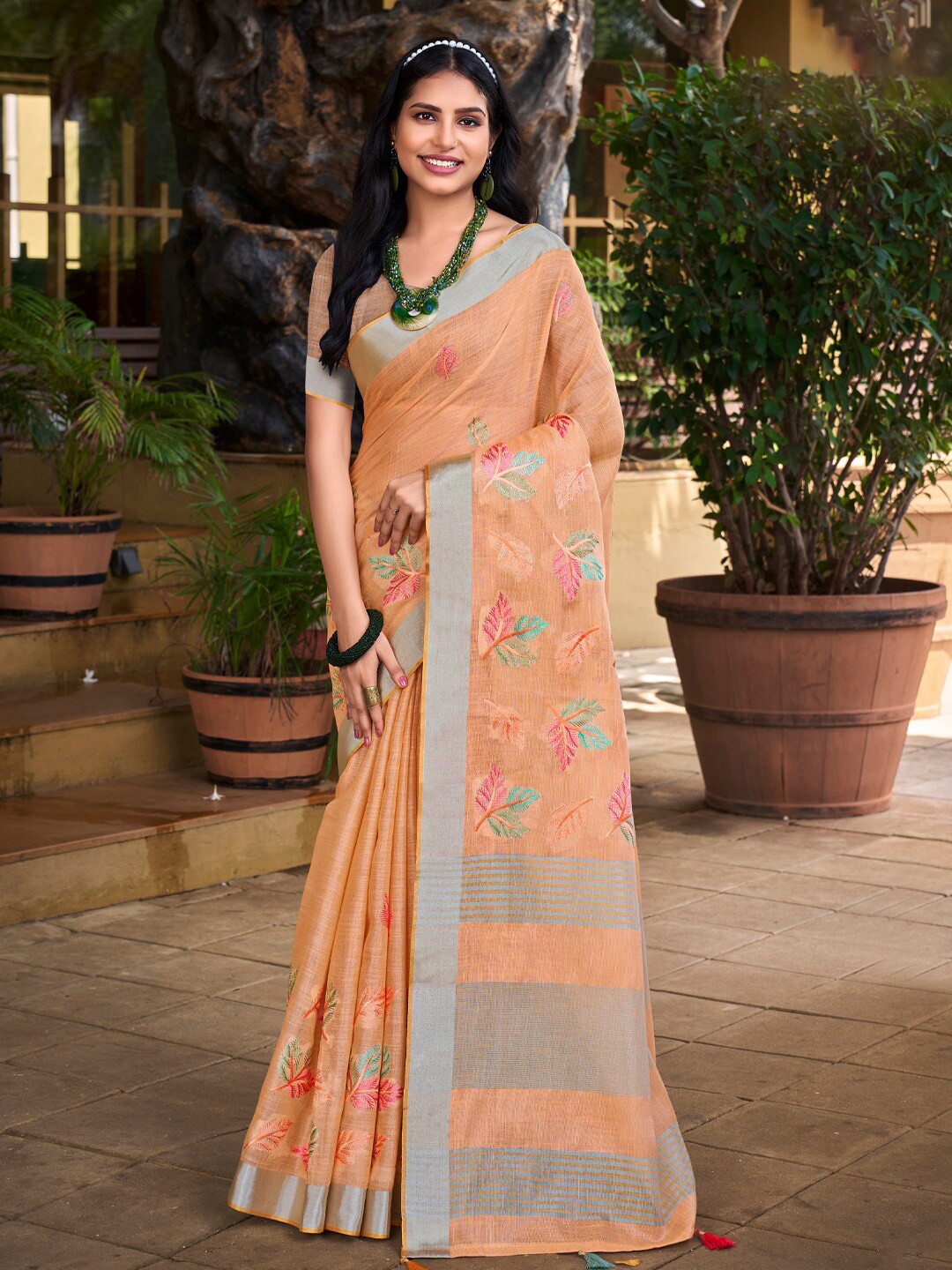 

Mitera Peach-Coloured Floral Embroidered Zari Saree