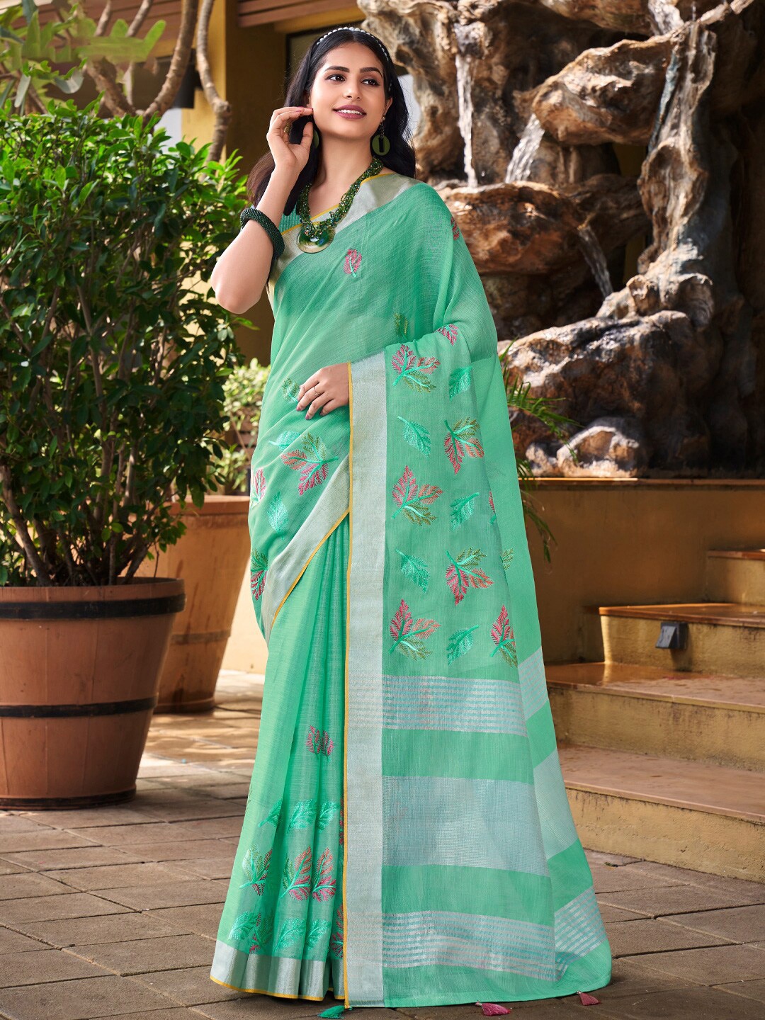 

Mitera Sea Green Floral Embroidered Linen Blend Saree